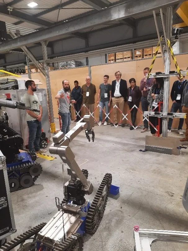 Figure 2: Seeing CERN commercial robots (left) and the TIM robot in the LHC mock-up (right)