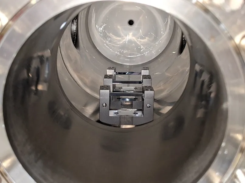 Three crystals in their holders before a bake-out test